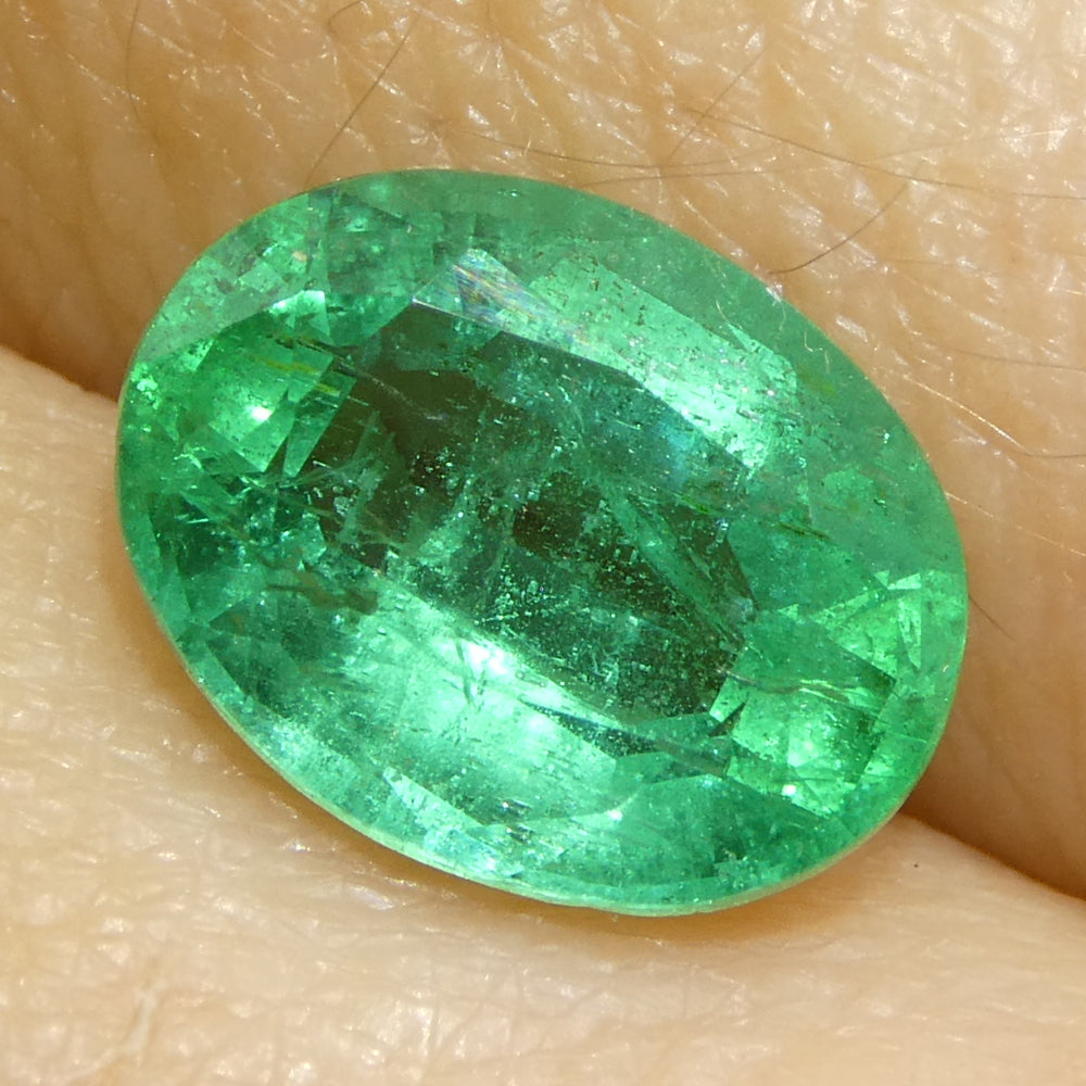 1.73ct Oval Green Zambian Emerald from SkyJems, premium Canadian gemstone specialists showcasing brilliant beryl stone