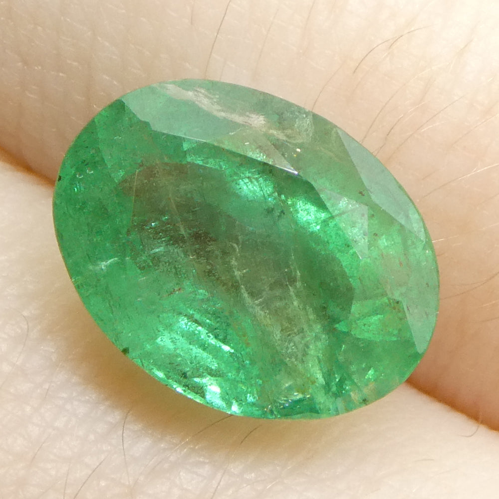 3.96ct Oval Green Zambian Emerald from SkyJems, premium beryl gemstone with vibrant medium-strong color and classic step cut