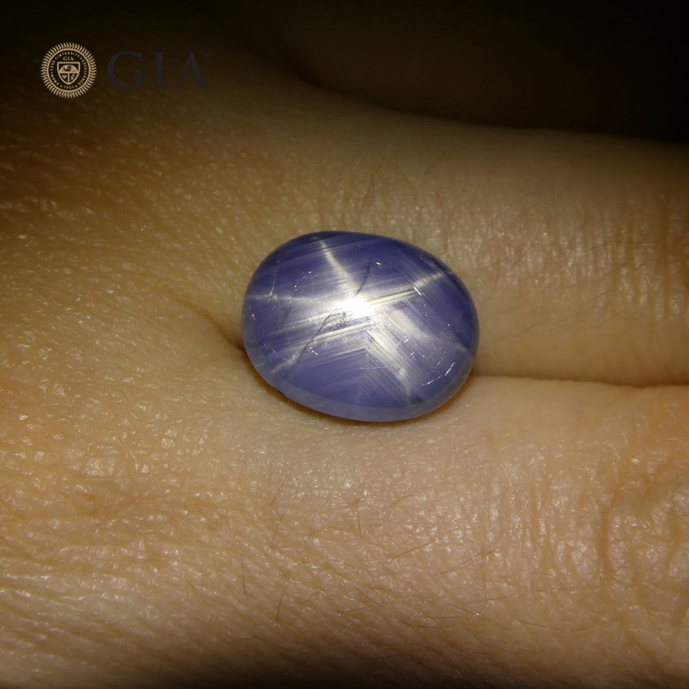 10.77ct Natural Blue Star Sapphire Oval Cabochon, GIA Certified Gemstone from SkyJems Canadian Gem Experts