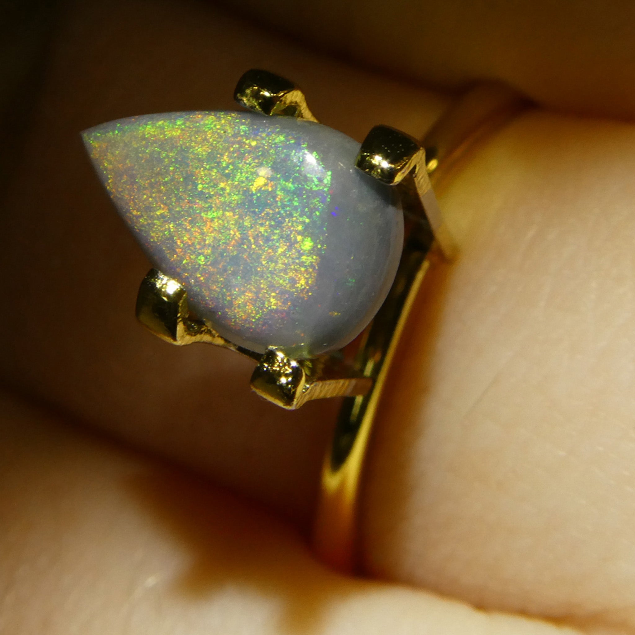 1.16ct Gray Australian Pear Cabochon Opal with Play of Color from SkyJems Gemstones Canada