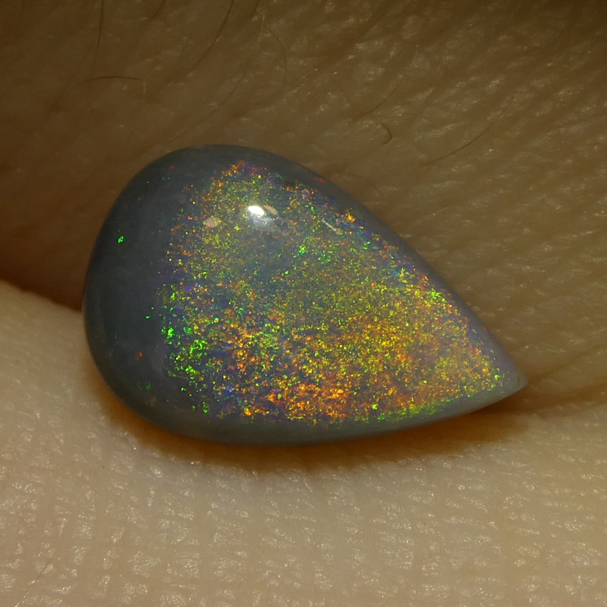 1.16ct Gray Australian Pear Cabochon Opal with Play of Color from SkyJems Gemstones Canada