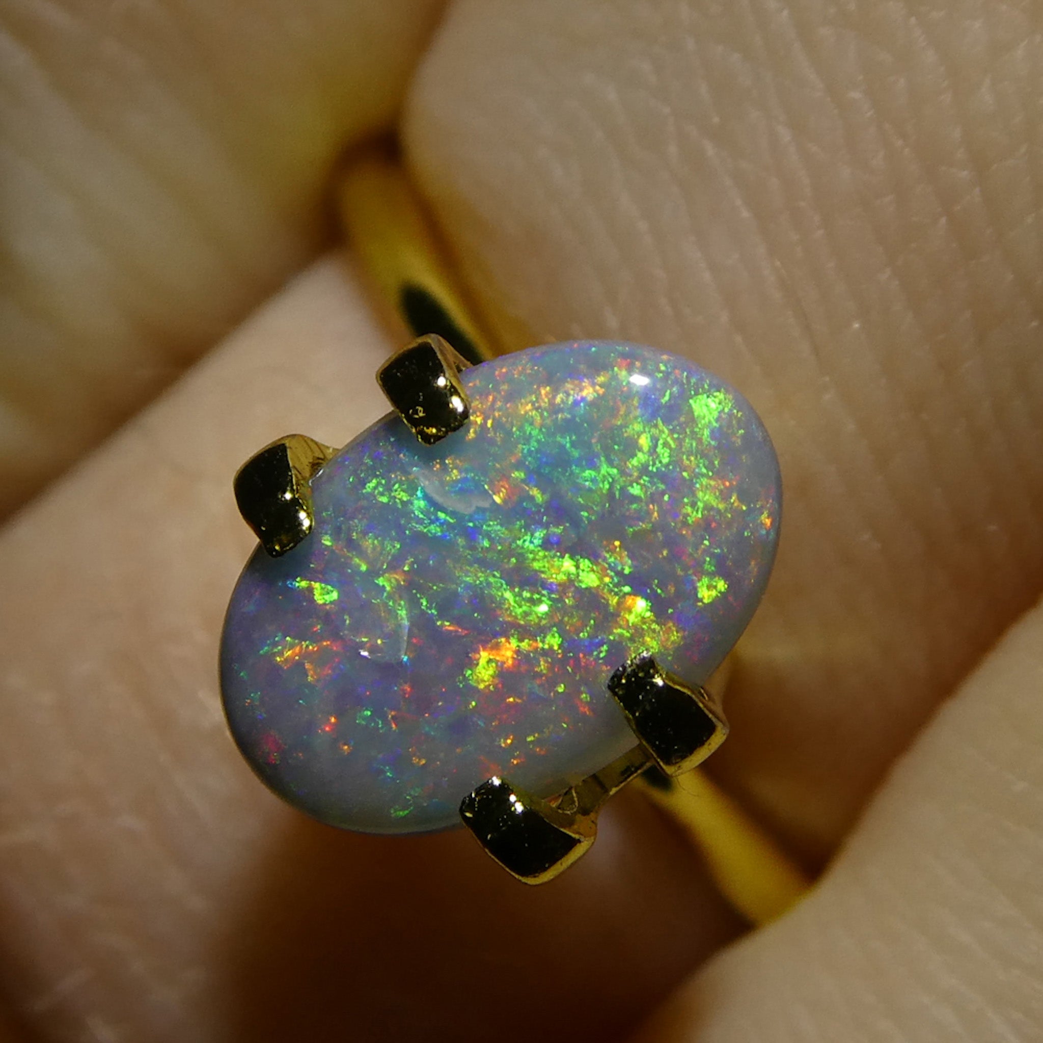 0.86ct Gray Oval Cabochon Opal from Australia, rare gemstone with play of color by SkyJems Canadian gem experts