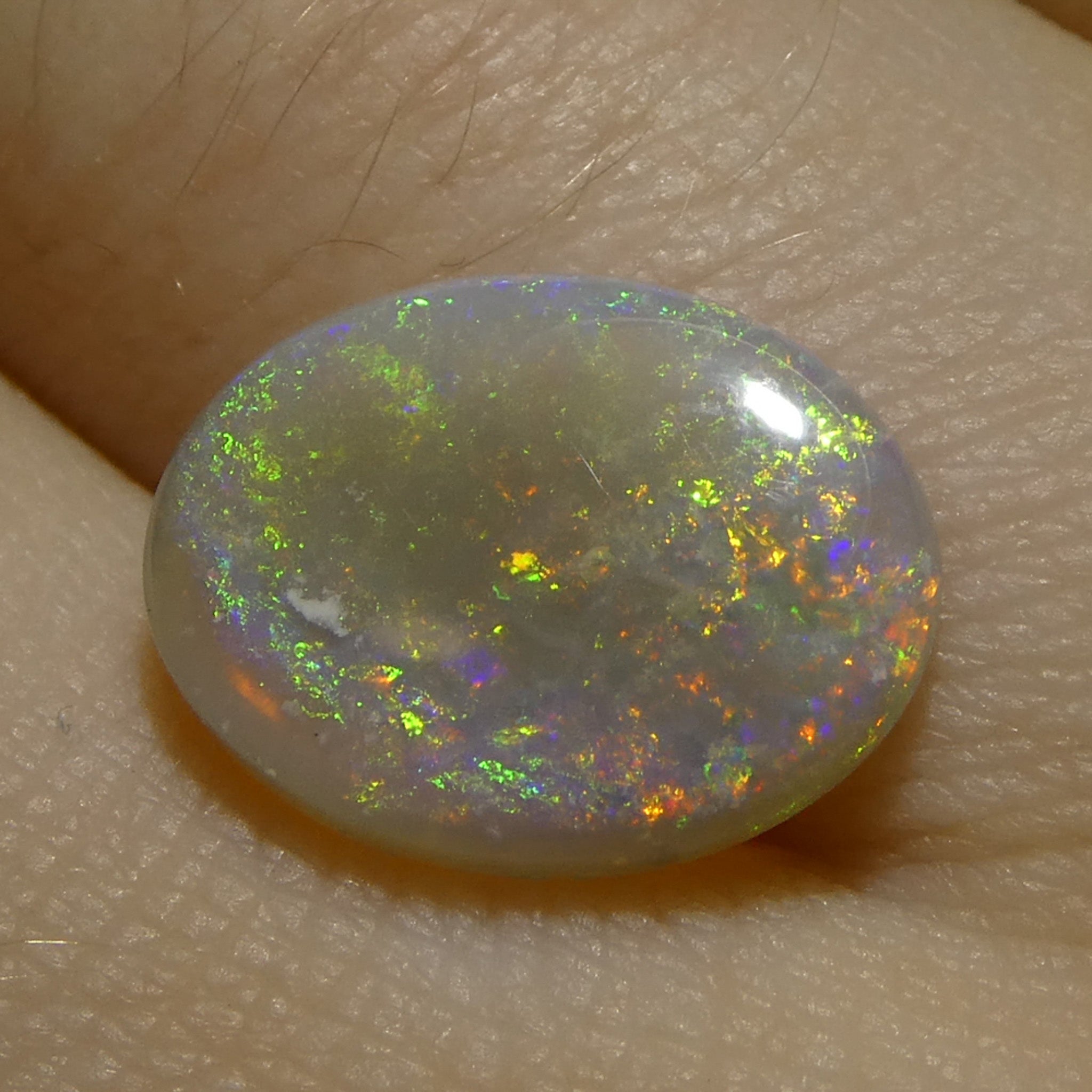 2.15ct White Opal Cabochon from Australia with Play of Color | Premium Gemstone by SkyJems Canadian Gem Experts