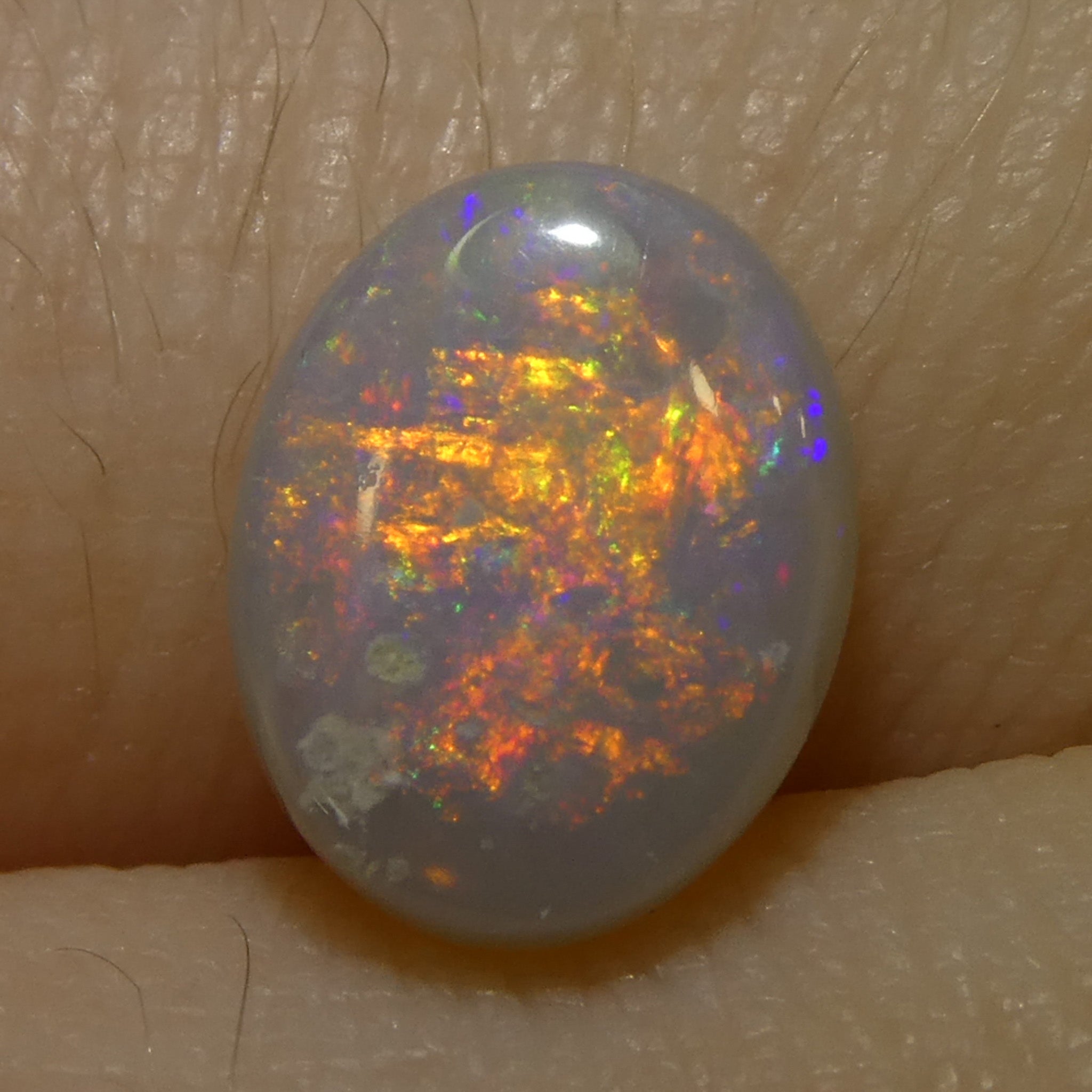 1.36ct Gray Oval Cabochon Opal from Australia, natural gemstone with play of color by SkyJems Canadian gem experts