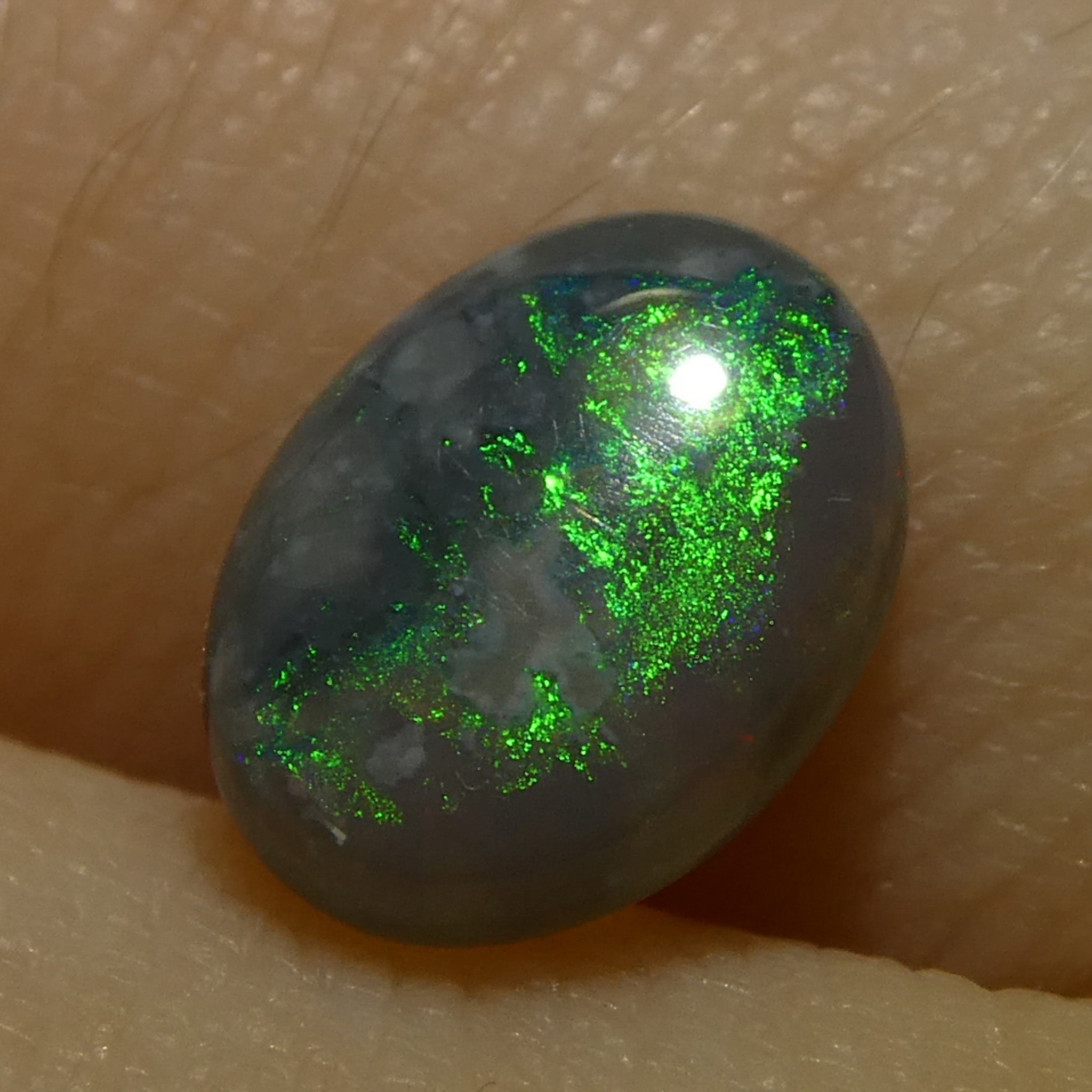 0.8ct Gray Oval Cabochon Opal from Australia, rare gemstone with play of color by SkyJems Canadian gem experts