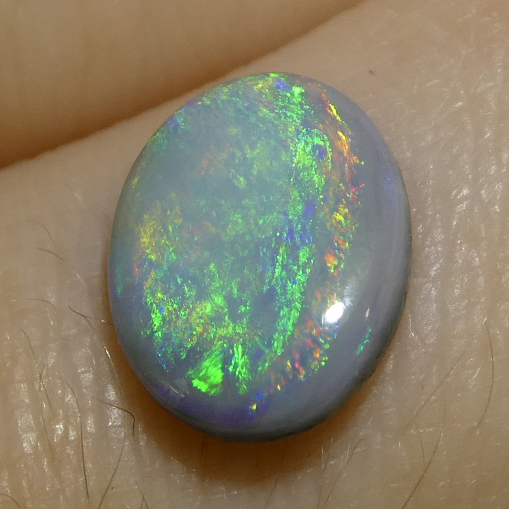 1.06ct Gray Oval Cabochon Opal from Australia with Play of Color, premium gemstone by SkyJems Canadian gem experts