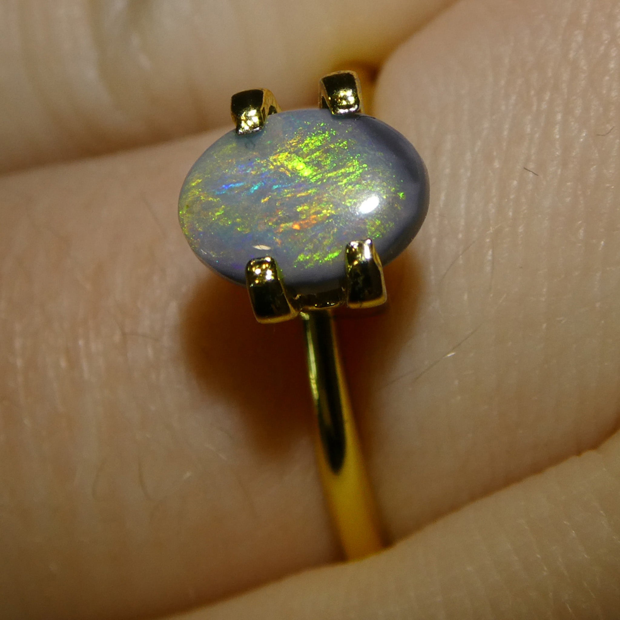 0.64ct Gray Oval Cabochon Opal from Australia with Play of Color, premium gemstone by SkyJems Canadian gem experts