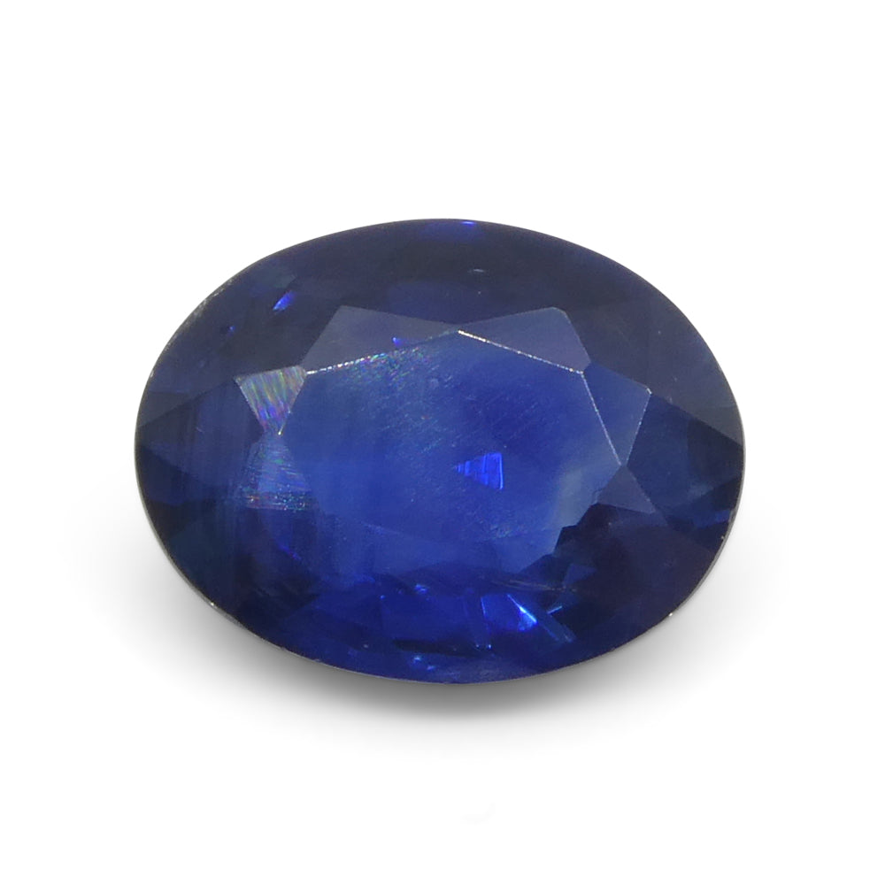 2-carat oval blue sapphire from Thailand, deep blue corundum gemstone by SkyJems Canadian gem specialists