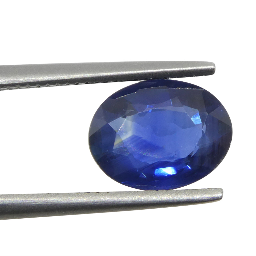 2-carat oval blue sapphire from Thailand, deep blue corundum gemstone by SkyJems Canadian gem specialists