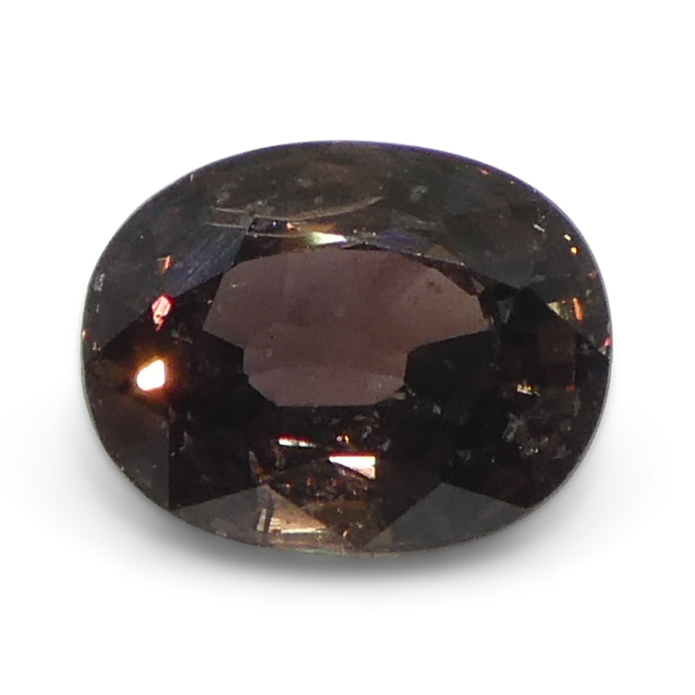 1.49ct Oval Brownish Pink Tanzanian Sapphire, heated single stone from SkyJems' premium colored gemstone collection