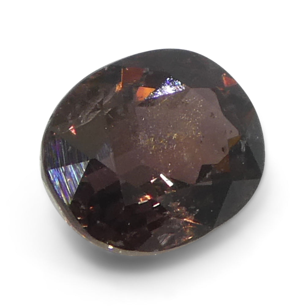 1.49ct Oval Brownish Pink Tanzanian Sapphire, heated natural gemstone from SkyJems Canadian gem specialists
