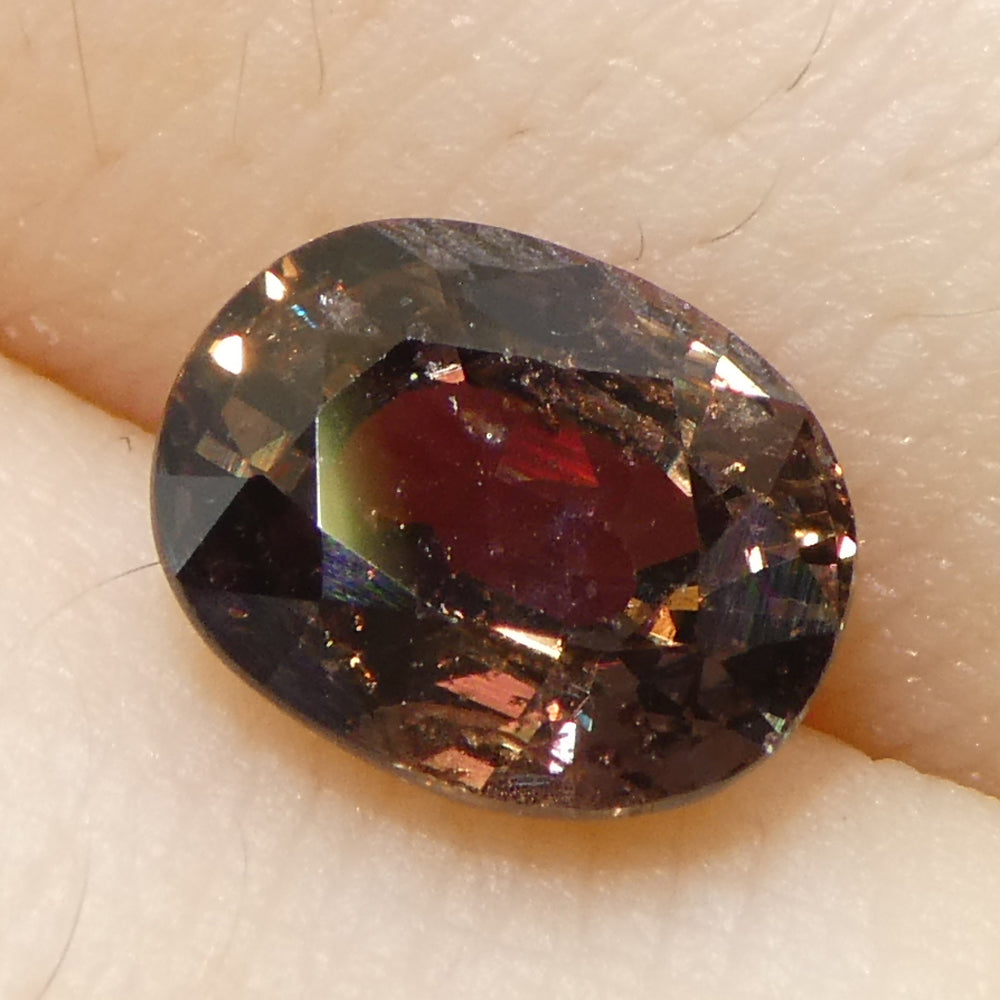 1.49ct Oval Brownish Pink Tanzanian Sapphire, heated natural gemstone from SkyJems' premium single-stone collection