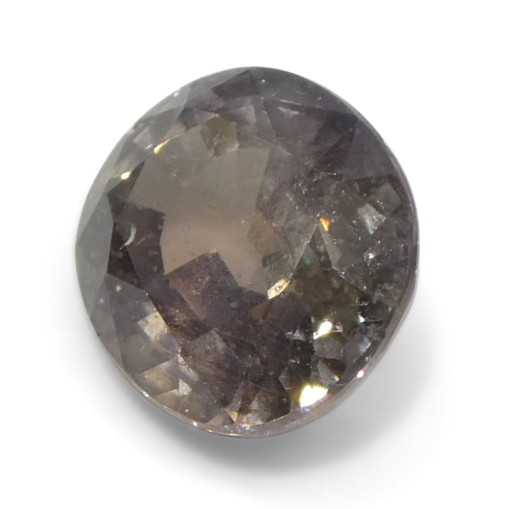1.76ct Greyish Pink Tanzanian Sapphire, oval-cut single stone from SkyJems' premium colored gemstone collection