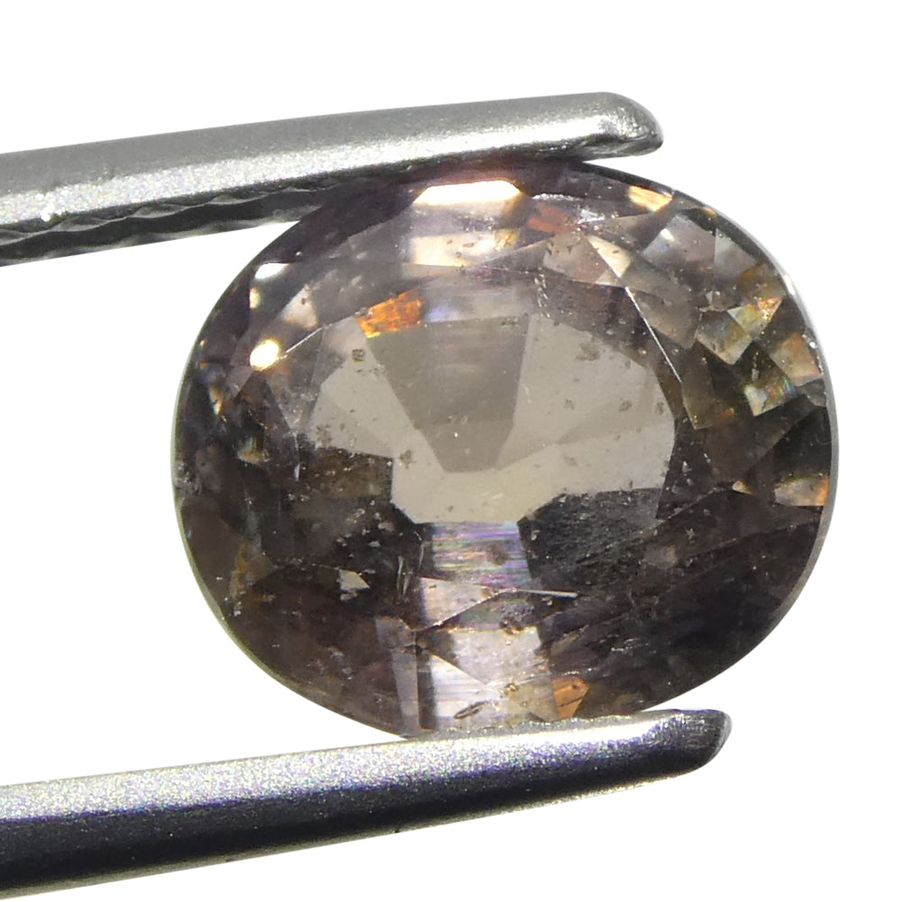 1.76ct Greyish Pink Tanzanian Sapphire, oval-cut single stone from SkyJems' premium colored gemstone collection