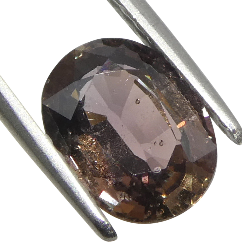 1.57ct Oval Brownish Pink Tanzanian Sapphire, heated single stone from SkyJems Canadian gem specialists