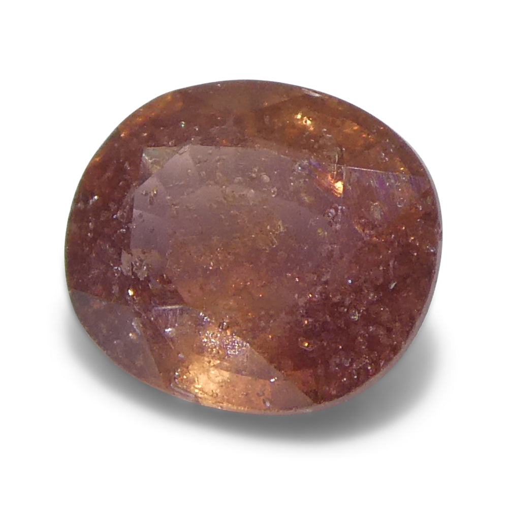 1.4ct Tanzanian Pink Sapphire, cushion-cut gemstone in orangey pink, premium quality from SkyJems Canadian gem specialists