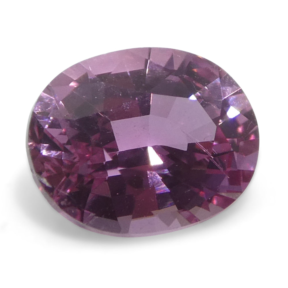 0.69ct Oval Pink Sapphire from Madagascar, purplish pink hue, heated gemstone by SkyJems Canadian gem specialists