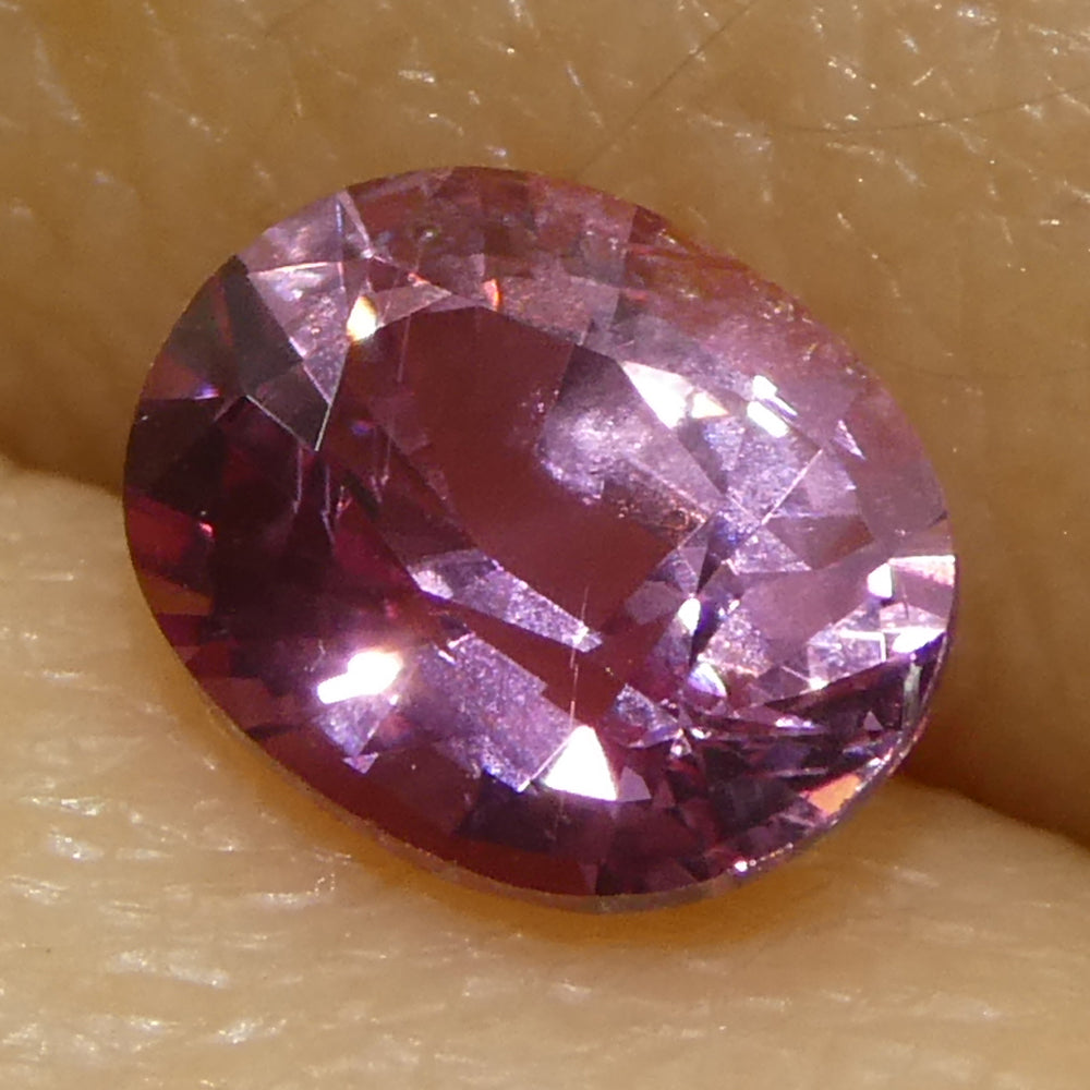 0.69ct Oval Pink Sapphire from Madagascar, purplish pink gemstone by SkyJems, premium Canadian colored gem specialists