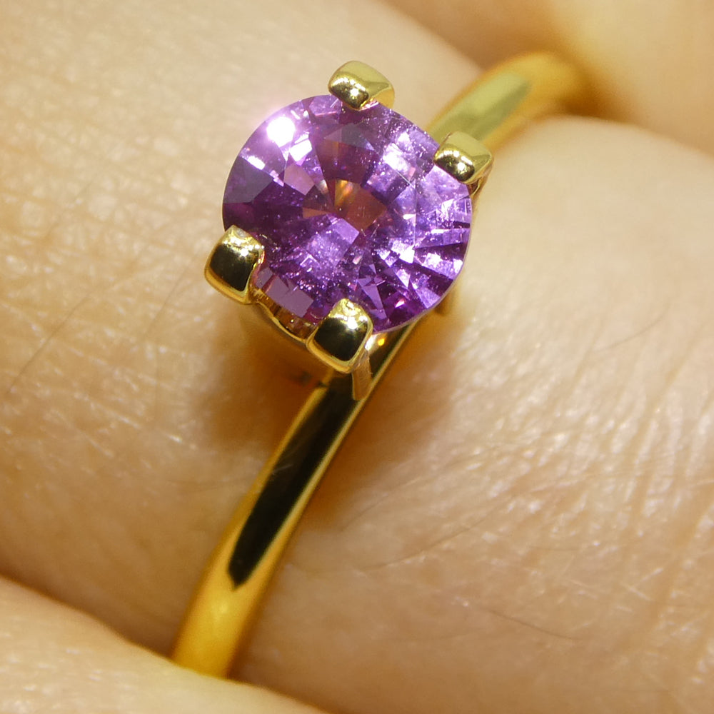 0.76ct Oval Pink Sapphire from Madagascar, vibrant medium-strong color, precision-cut by SkyJems Canadian gemstone experts