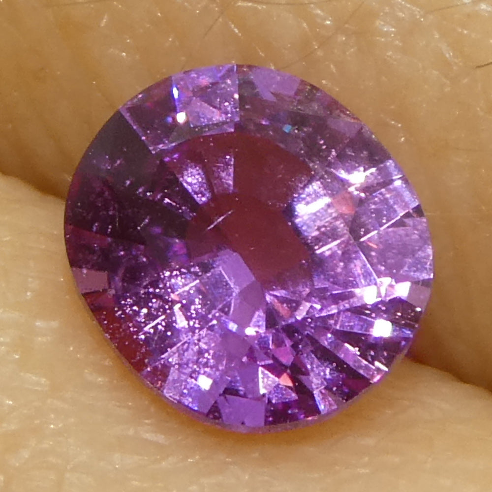0.76ct Oval Pink Sapphire from Madagascar, vibrant medium-strong pink hue, precision-cut by SkyJems Canadian gemstone experts