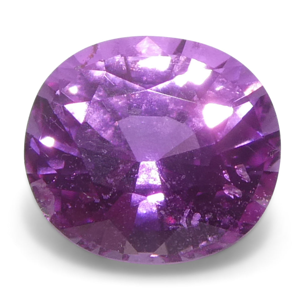 0.99ct Oval Purple-Pink Madagascar Sapphire from SkyJems, premium heated gemstone with vivid color and elegant step cut
