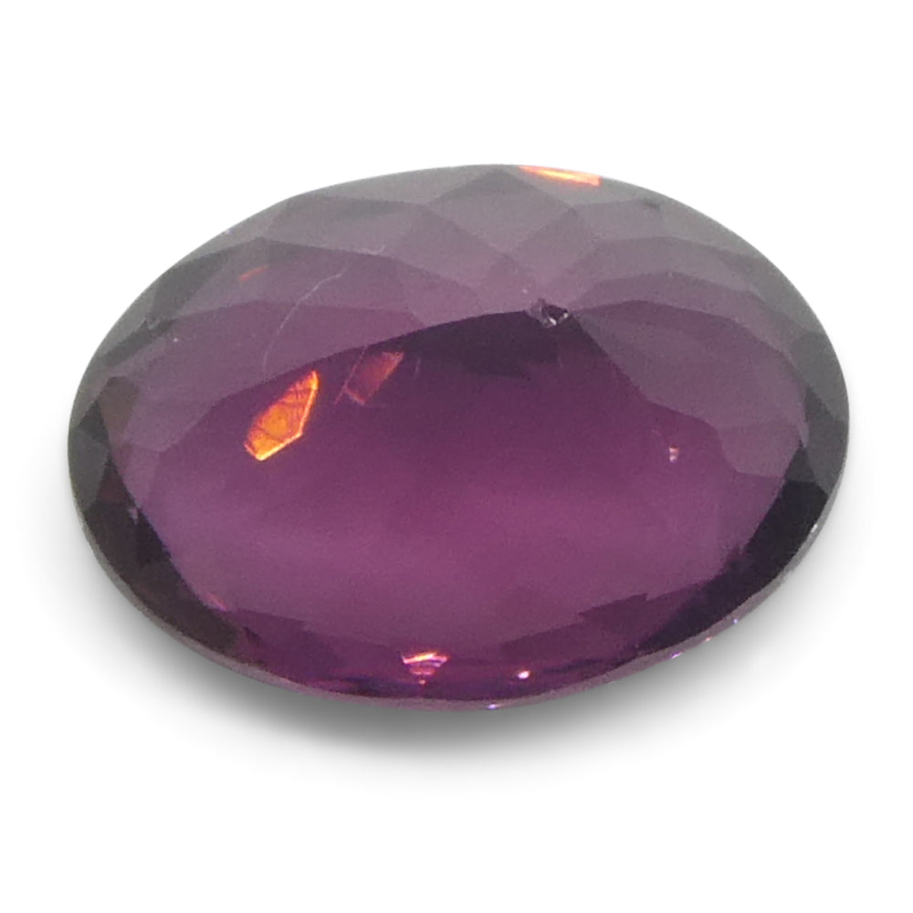 1.69ct Burmese Pink Spinel, unheated oval gem from SkyJems' rare gemstone collection, brilliant-cut with purplish pink hue