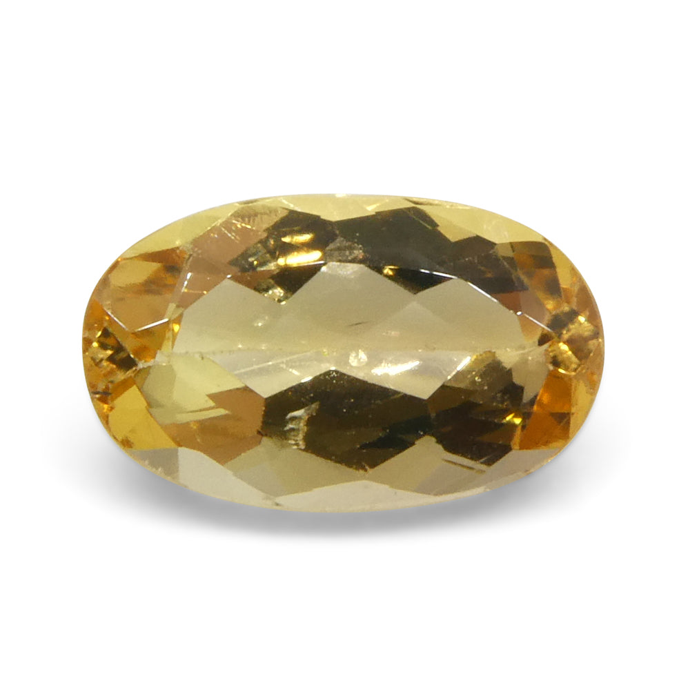 1.36ct Oval Brazilian Imperial Topaz in vibrant orange-yellow, unheated natural gemstone from SkyJems premium collection