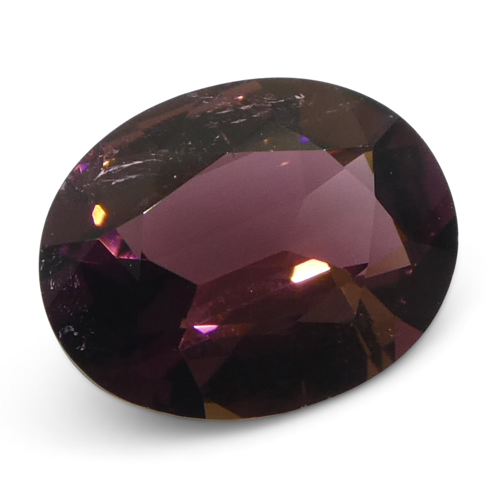2.1ct Oval Pink Tourmaline from Brazil, slightly orangy pink gemstone by SkyJems Canadian gem specialists
