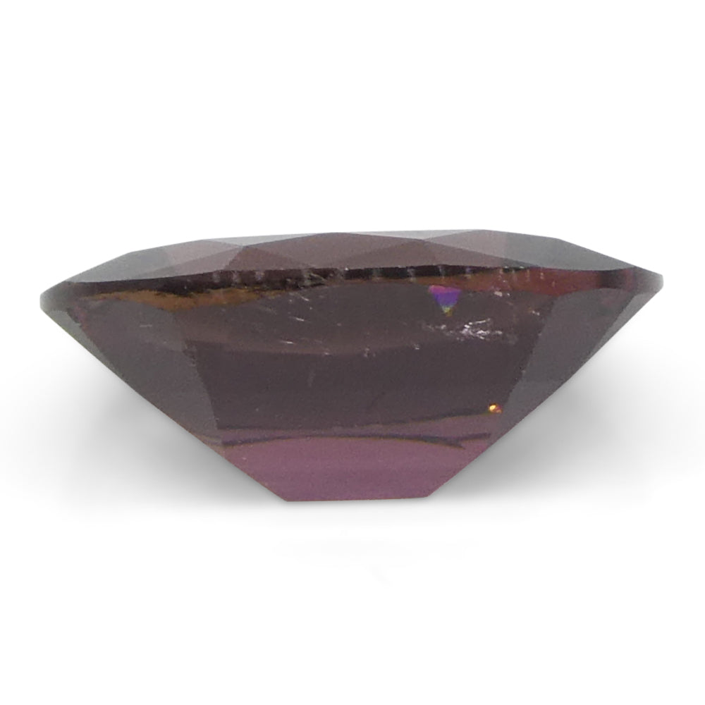 2.1ct Oval Pink Tourmaline from Brazil, slightly orangy hue, precision step cut by SkyJems Canadian gemstone experts