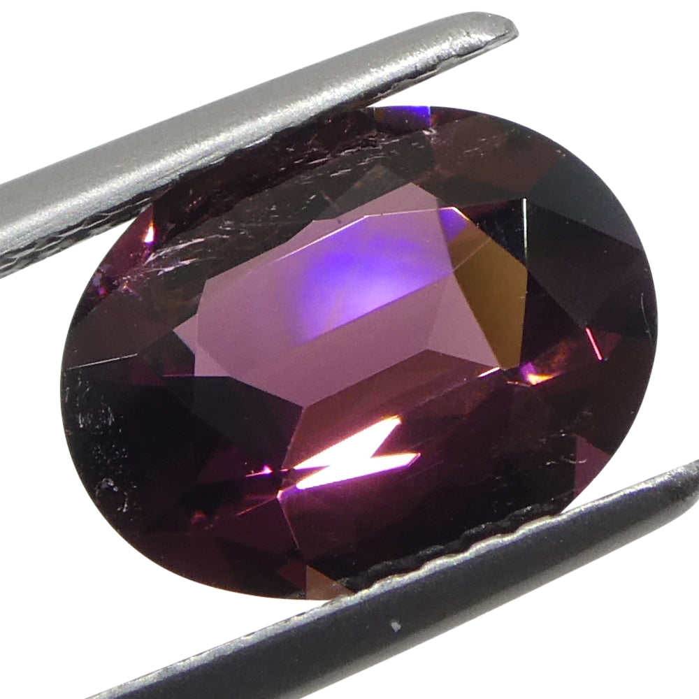 2.1ct Oval Pink Tourmaline from Brazil, slightly orangy pink gemstone by SkyJems Canadian gem specialists