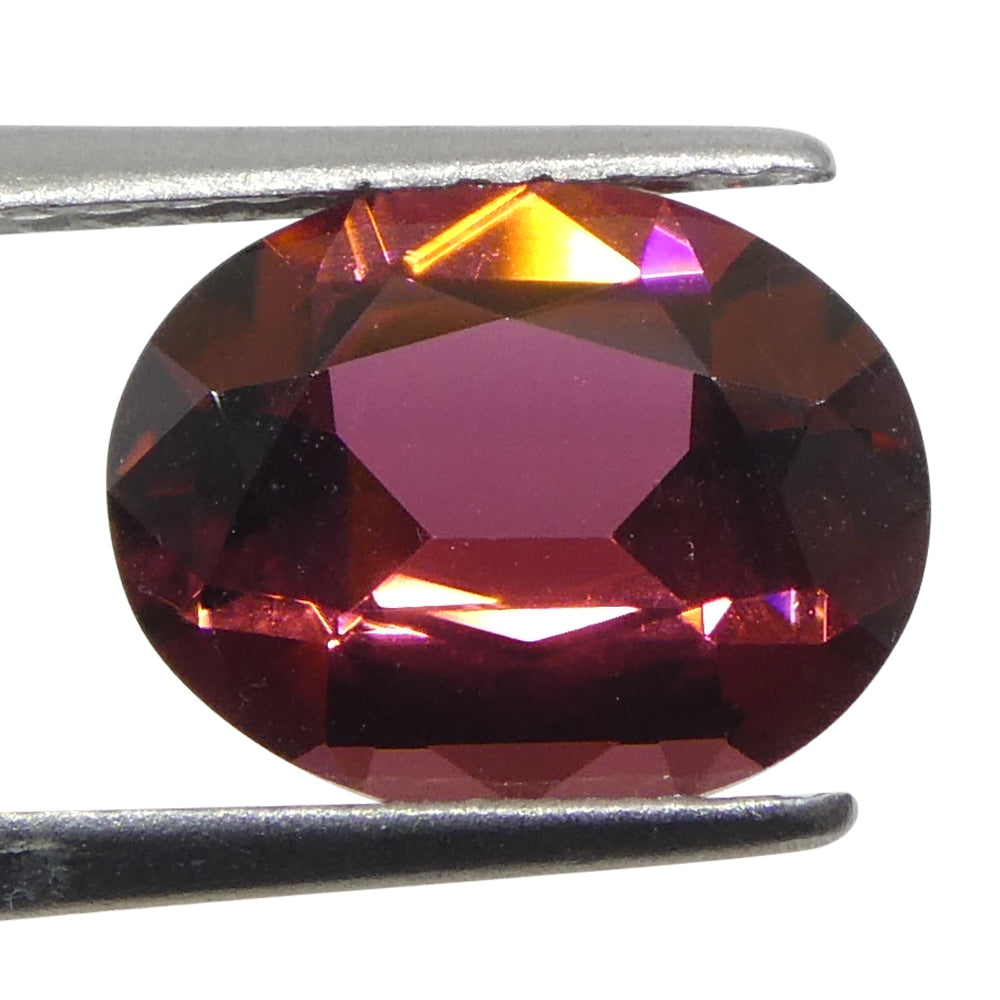 1.46ct Brazilian Oval Pink Tourmaline from SkyJems, premium pink gemstone with vibrant orangy-pink hue and elegant step cut