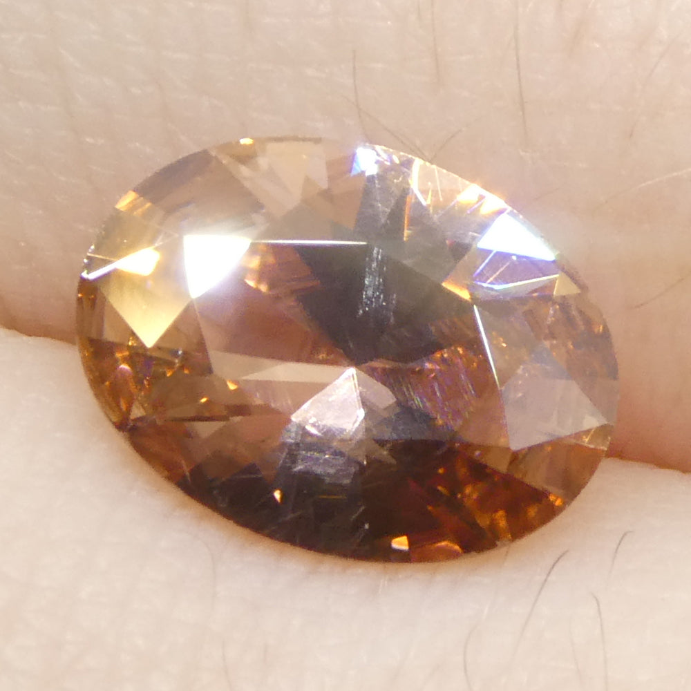 2.31ct Natural Earth Mined Oval Master Brilliant Cut Orange-Pink Zircon from Sri Lanka - Skyjems Wholesale Gemstones