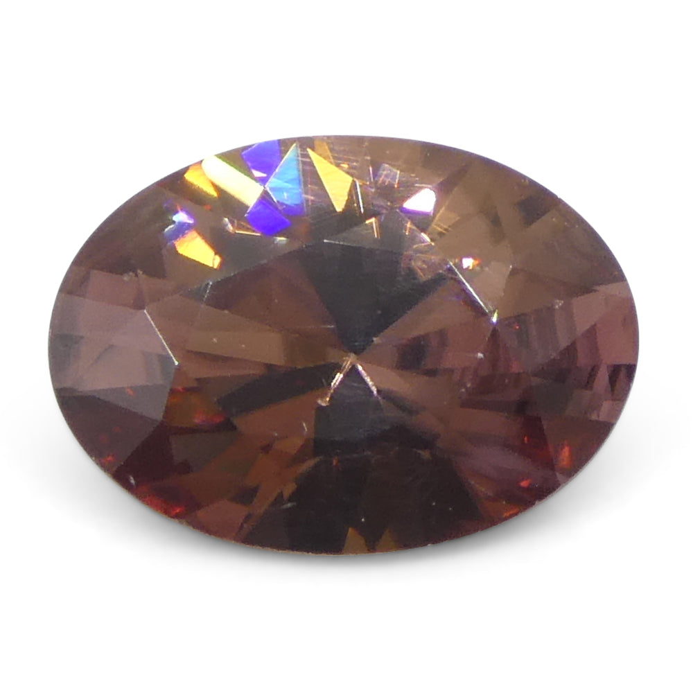 1.53ct Natural Orange Zircon from Sri Lanka, Oval Brilliant Cut Gemstone by SkyJems Canadian Gem Specialists