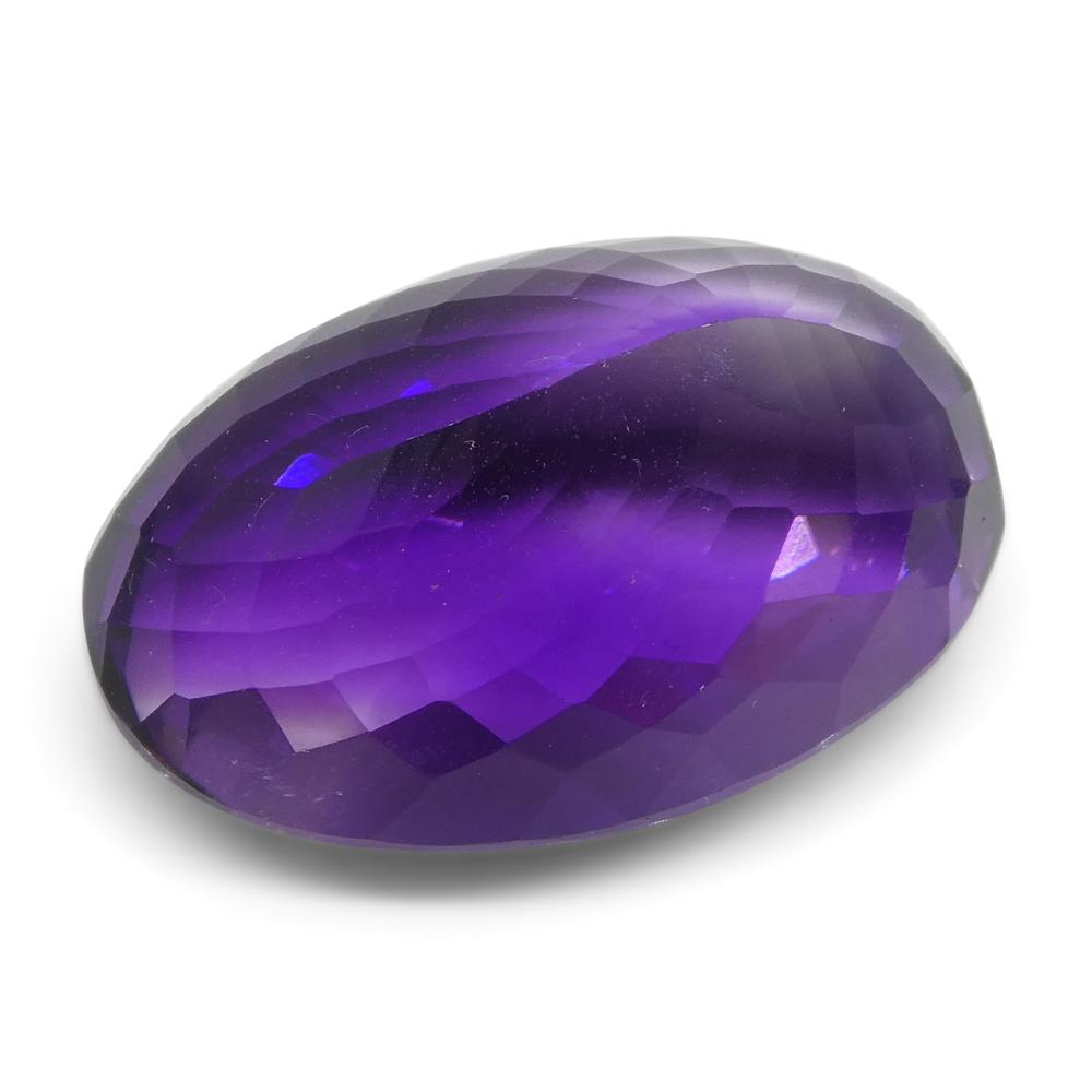 Large 21.55 ct purple Brazilian oval amethyst from SkyJems, unheated Modified Brilliant-cut gemstone with vibrant color and e