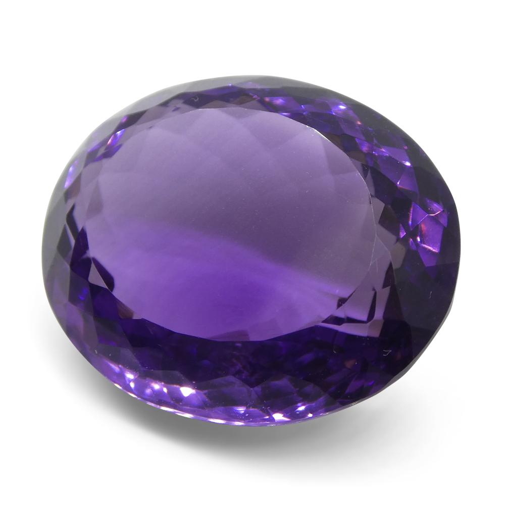 Large 22.57 ct purple Brazilian oval amethyst from SkyJems, unheated modified brilliant-cut single gemstone with rich color