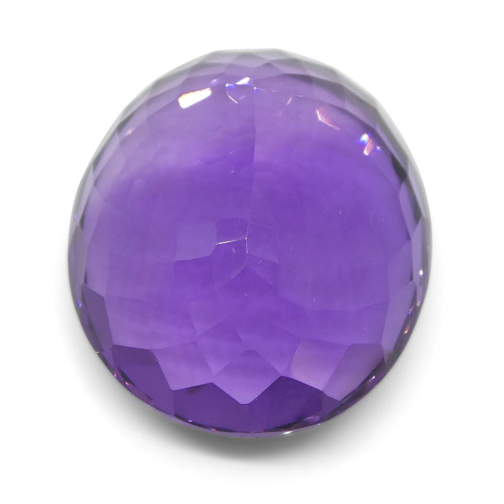 Large 22.57 ct purple Brazilian oval amethyst from SkyJems, unheated Modified Brilliant-cut gemstone showcasing rich violet q