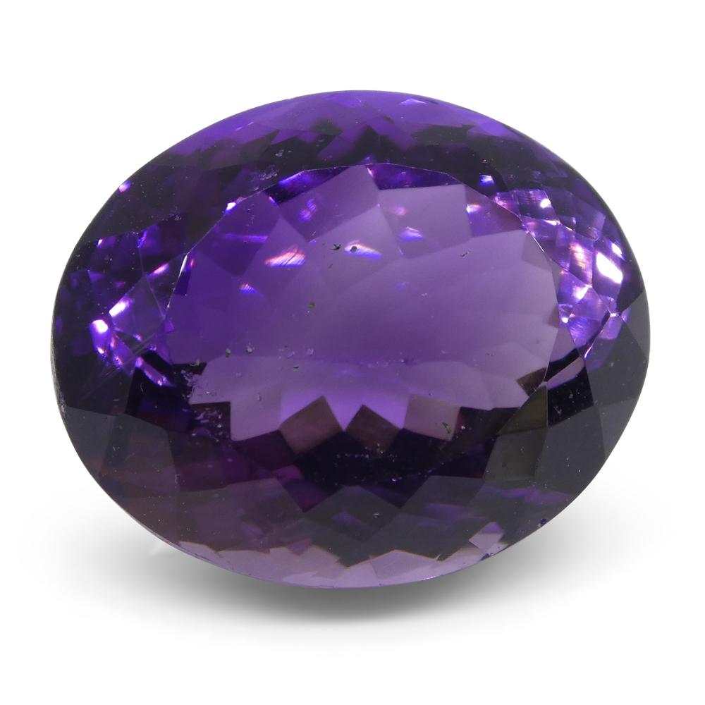 Large 17.98 ct purple oval amethyst from Brazil, precision-cut Modified Brilliant style by SkyJems Canadian gemstone experts