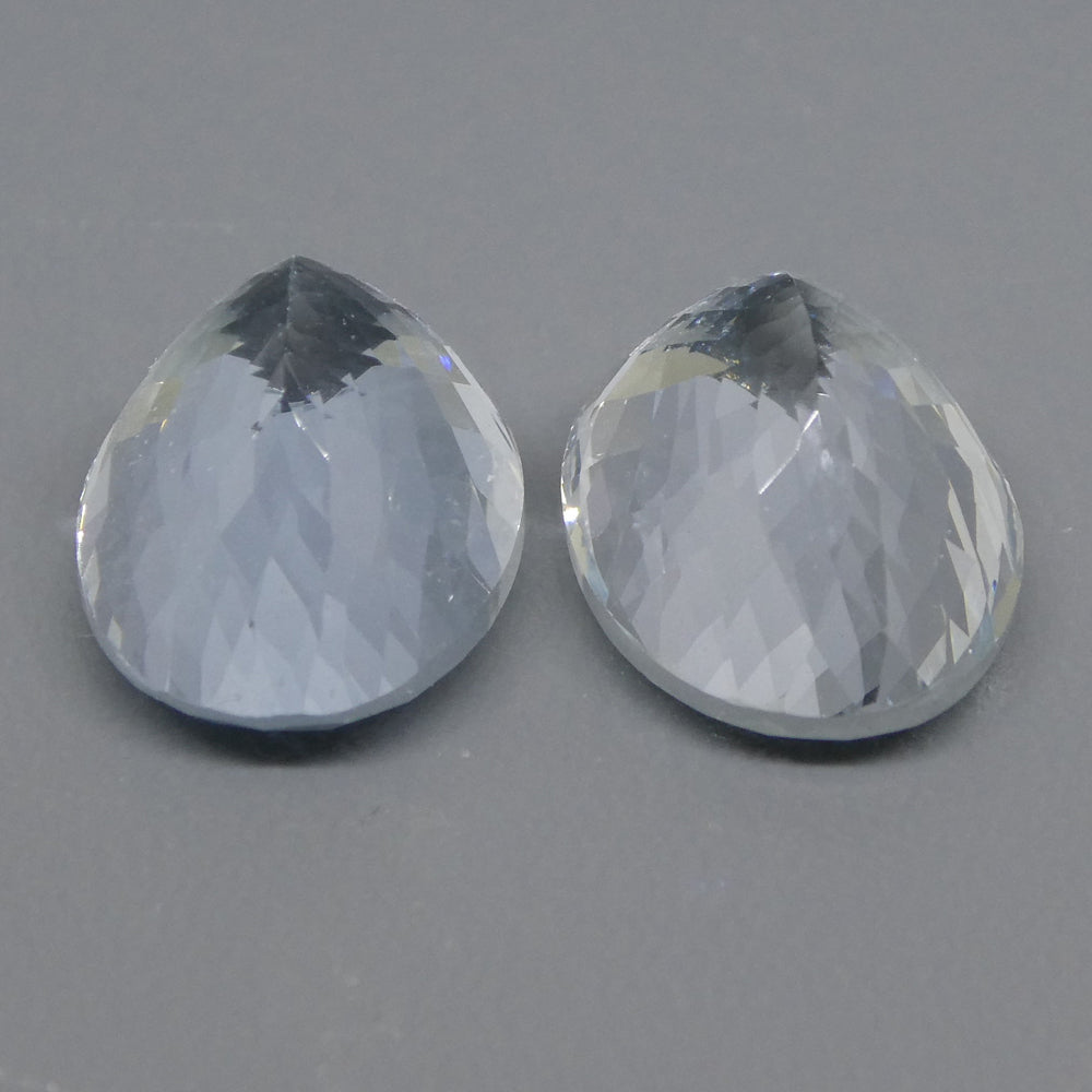 Vivid blue Brazilian aquamarine oval pair, 12.58 carats, premium mixed cut gemstones from SkyJems Canadian gem specialists