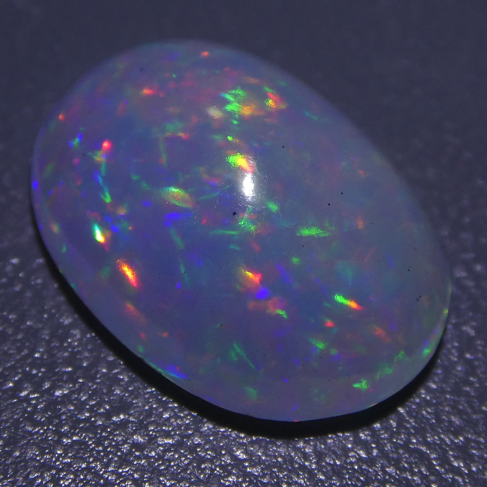 3.01ct Ethiopian Crystal Opal with Vibrant Play of Colour, Oval Cabochon Cut - Premium Gemstone by SkyJems Canada