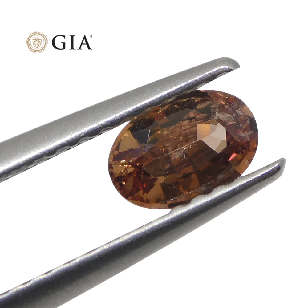0.46ct Oval Pinkish Orange Padparadscha Sapphire from Madagascar, GIA Certified Natural Gemstone by SkyJems