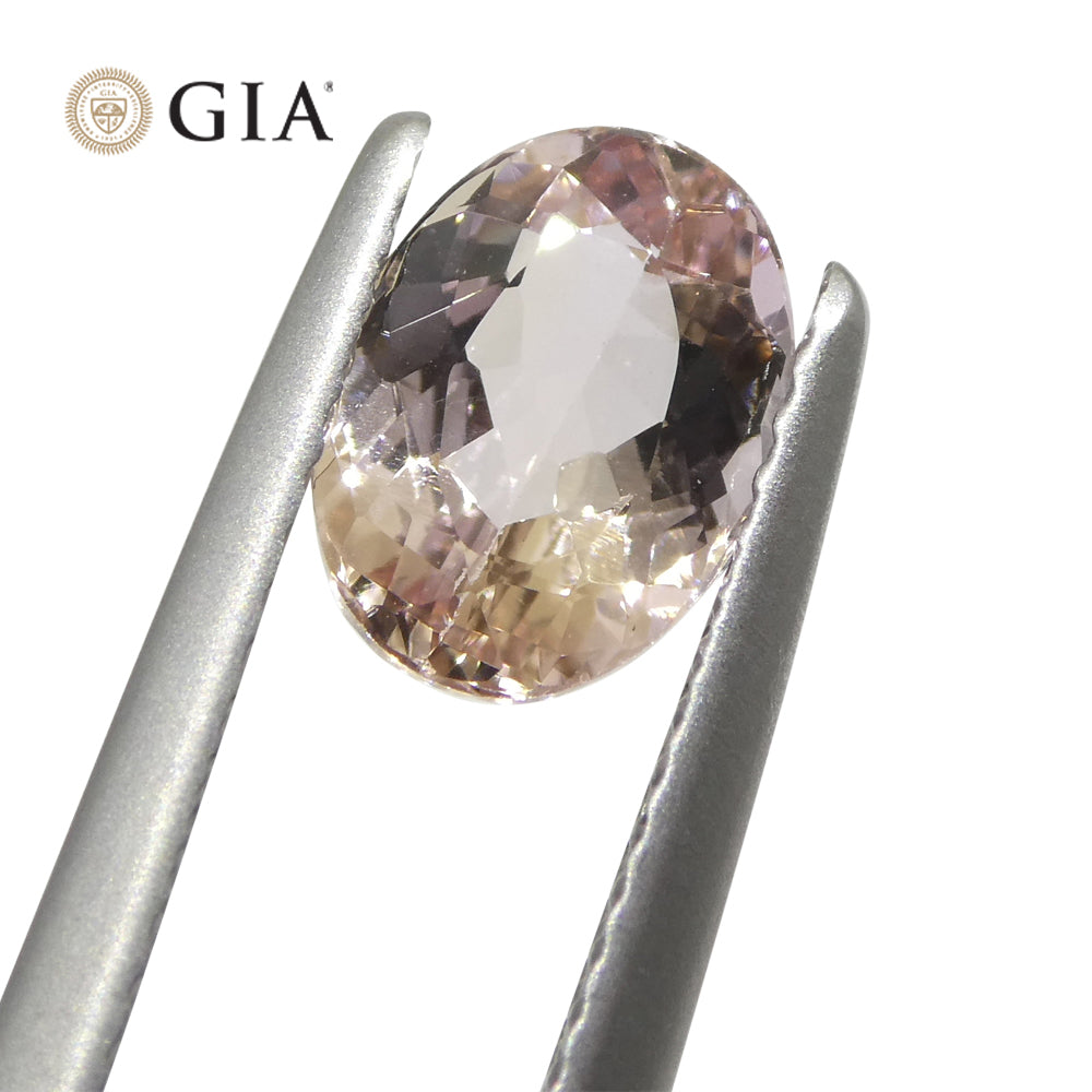 1.5ct Oval Brazilian Orange-Pink Imperial Topaz, GIA Certified Gemstone from SkyJems' Premium Colored Stone Collection