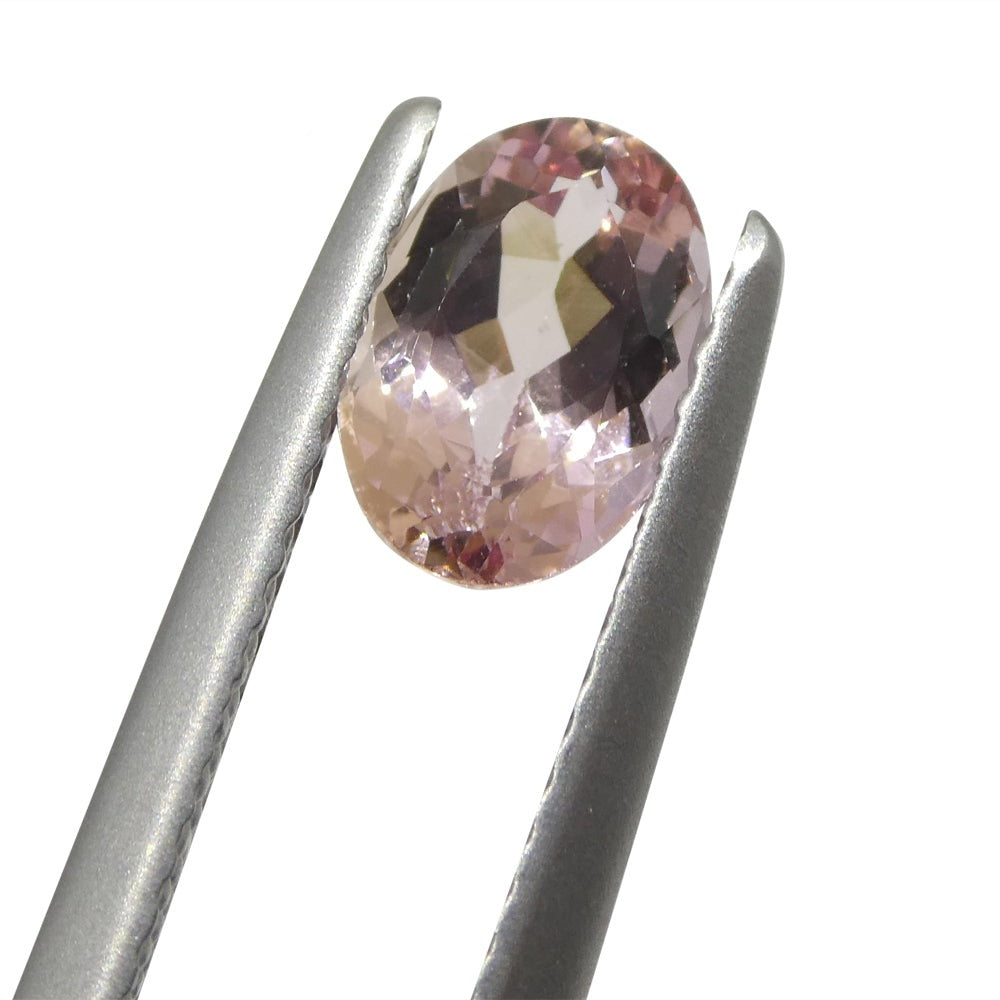 1.16ct Oval Orangy Pink Imperial Topaz from Brazil, GIA Certified Gemstone by SkyJems Canadian Fine Gems