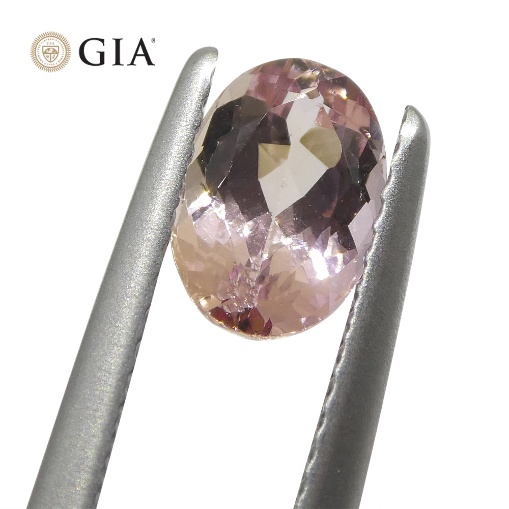 1.16ct Oval Orangy Pink Imperial Topaz from Brazil, GIA Certified Gemstone by SkyJems Canadian Fine Jewelry
