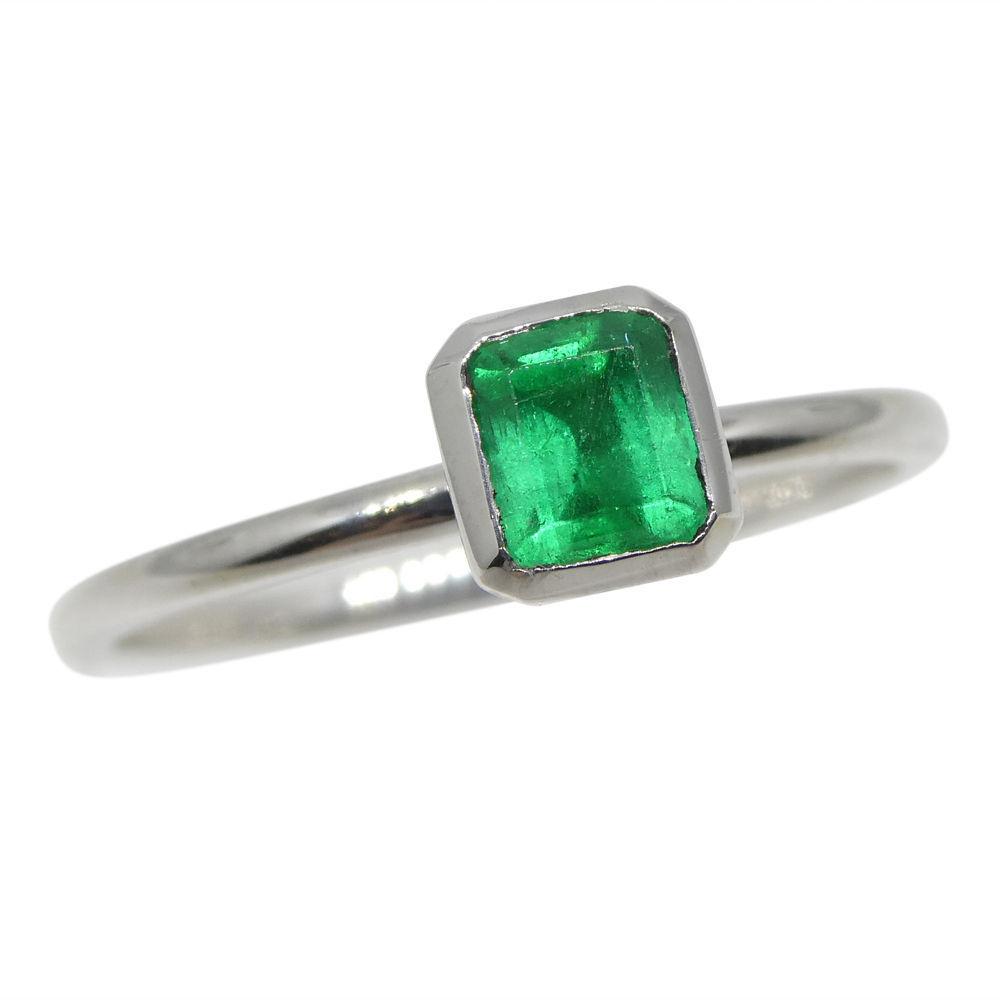Dainty Colombian emerald octagon-cut stacker ring in 10kt white gold, handcrafted by SkyJems Canadian jewellers