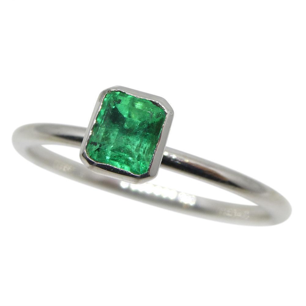 Dainty Colombian emerald octagon-cut stacker ring in 10kt white gold, handcrafted by SkyJems Canadian jewellers