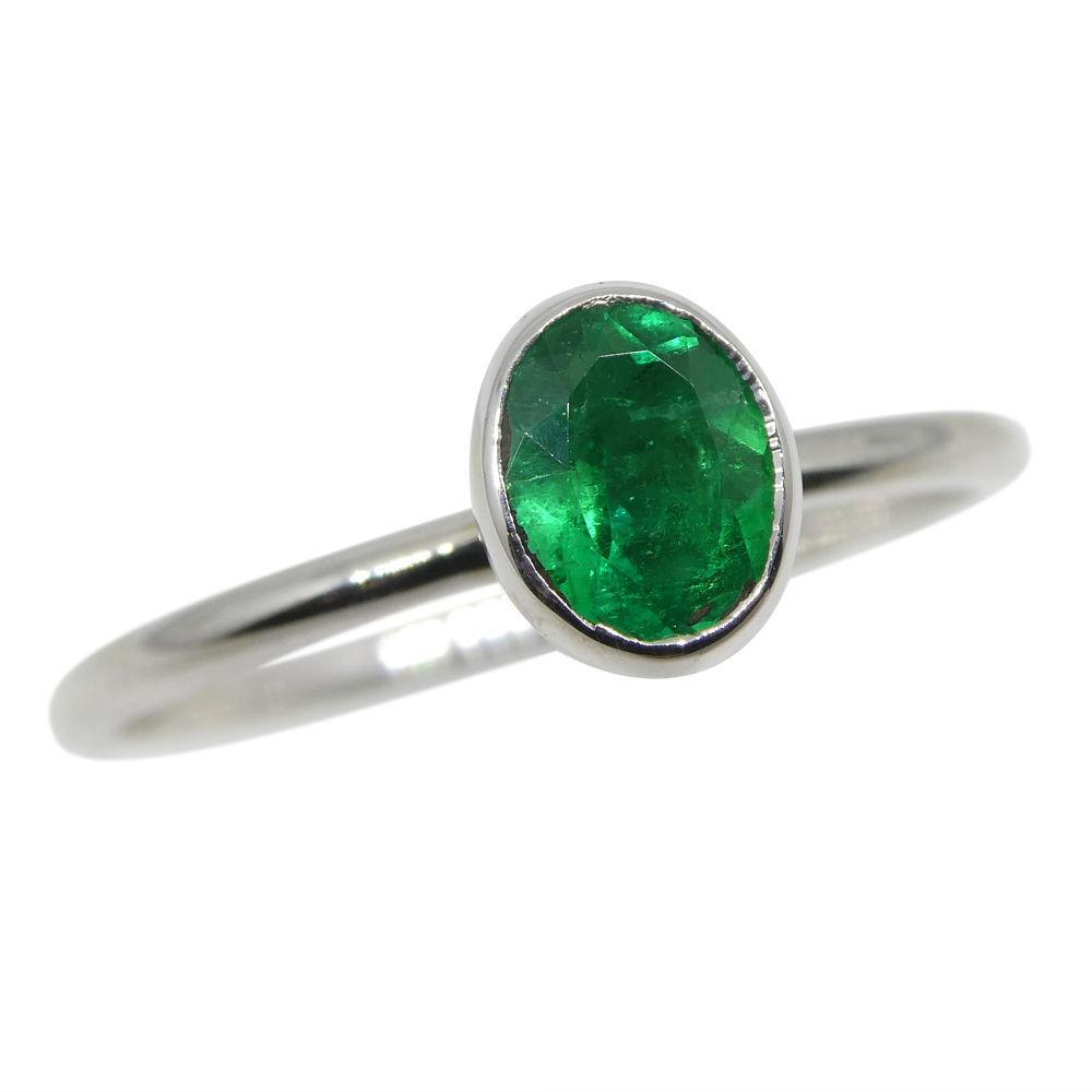 SkyJems Colombian emerald oval stacker ring in 10kt white gold, dainty green gemstone jewelry crafted in Canada