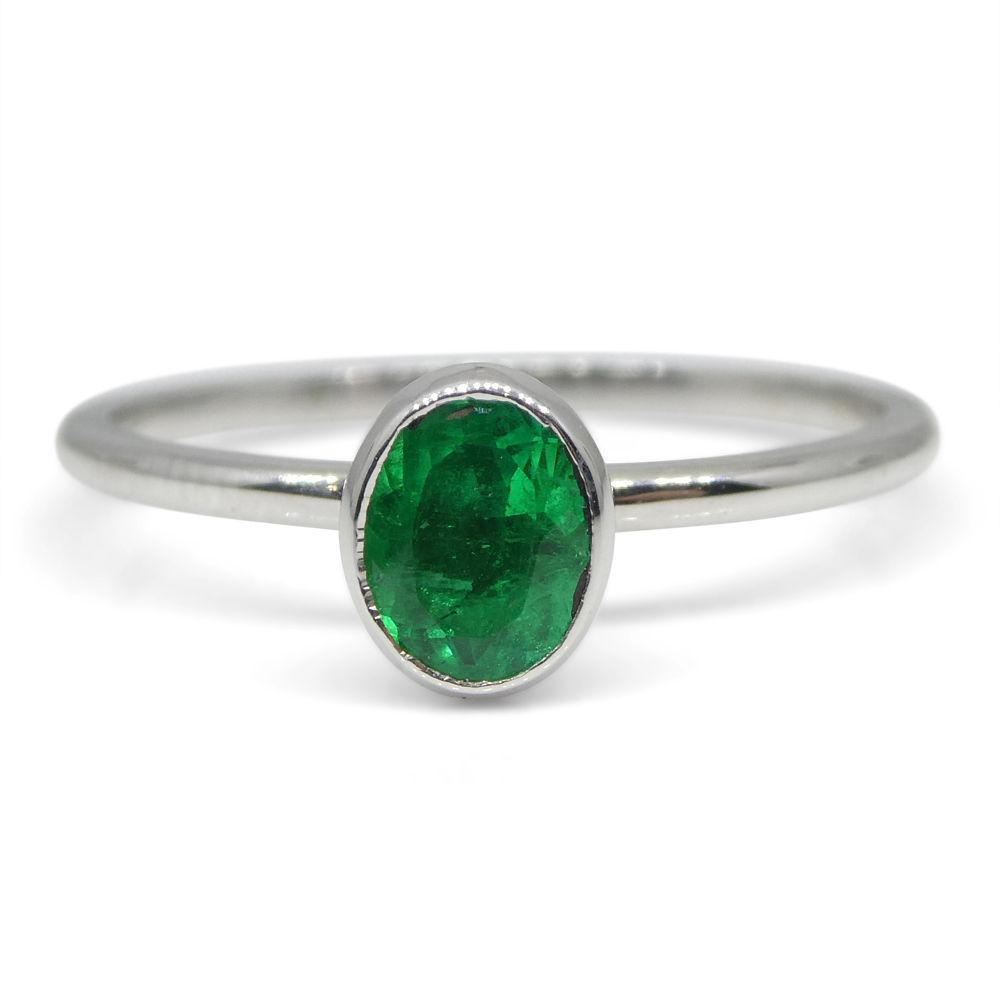 Dainty Colombian emerald oval stacker ring in 10kt white gold, handcrafted by SkyJems Canadian jewellers since 1967
