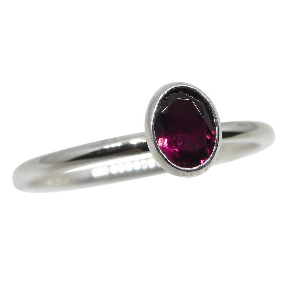Dainty red tourmaline stacker ring in 10kt white gold, handcrafted by SkyJems Canadian jewellers, elegant oval solitaire desi