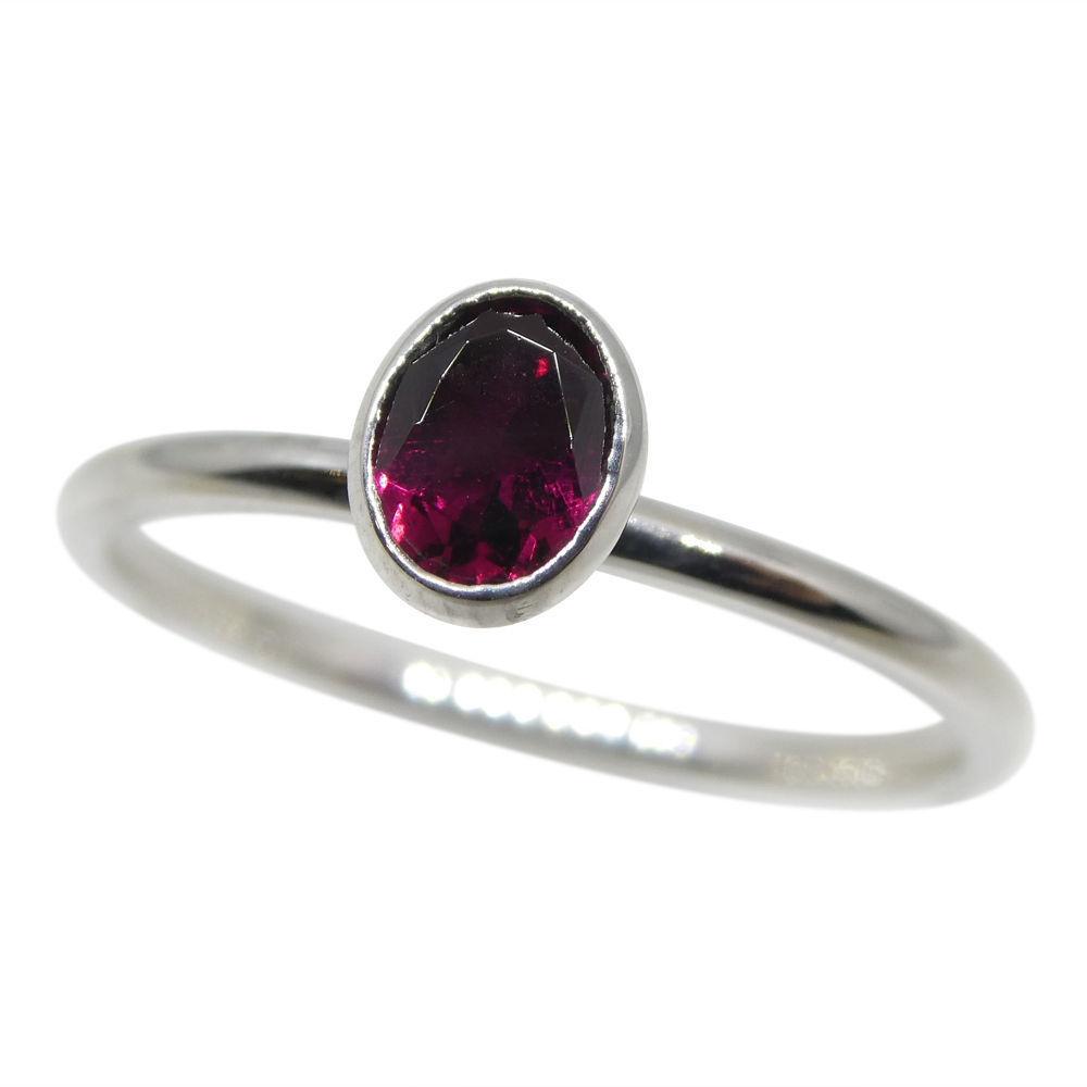Dainty red tourmaline stacker ring in 10kt white gold, handcrafted by SkyJems Canadian jewellers, elegant oval solitaire desi