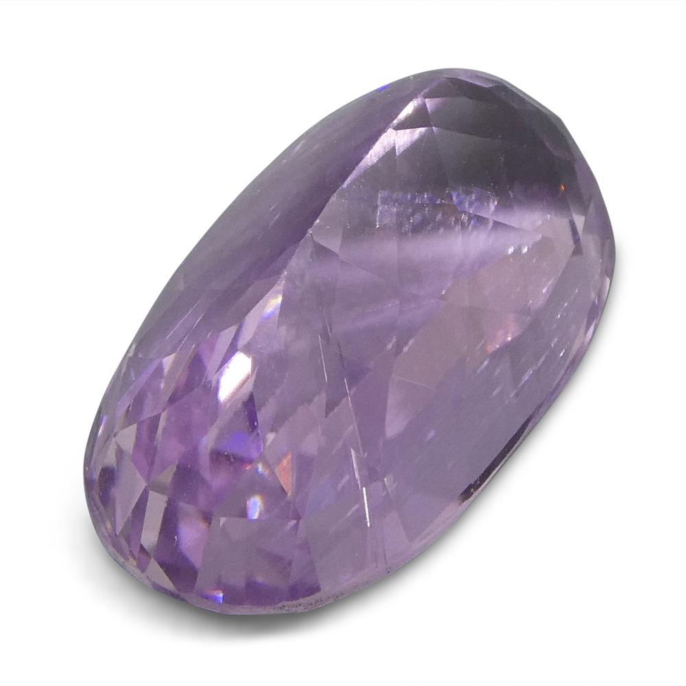 15.98 ct Slightly Purplish Pink Kunzite from Afghanistan, oval mixed cut gemstone by SkyJems Canadian gem specialists